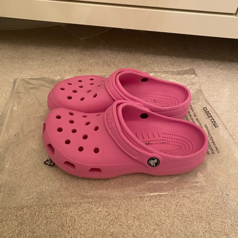 Pink crocs